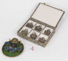 A collection of eight Chinese filigree and enamelled miniature handbags, in original case;
