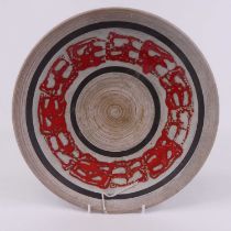 A 1970's West German parcel glazed pottery dish, dia. 30cm