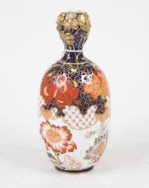 A 19th century Crown Derby vase, decorated in the Imari palette in shades of iron red and cobalt