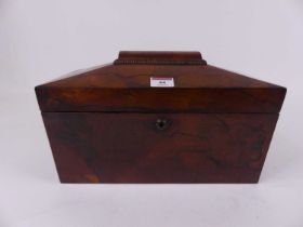 A Regency rosewood tea caddy of sarcophagus shape, width 33cm, containing a small collection of