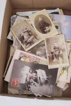 A collection of early 20th century and later mostly continental postcards, to include portrait and