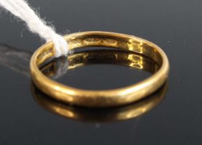 A 22ct gold wedding band, size N, 2.2g
