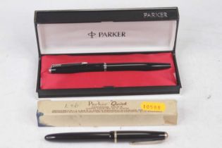 A Parker Slimford fountain pen having a 14ct gold Parker nib with black cap and barrel gold plated