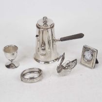 A collection of miscellaneous items, to include a modern Carrs silver clad quartz movement clock,