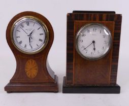 An Edwardian mahogany and inlaid balloon shaped mantel clock, having later quartz movement and dial,