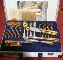 A Novella 12 place setting canteen of gold plated cutlery