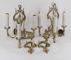 A pair of Art Nouveau style brass three sconce ceiling light fittings; together with a pair of