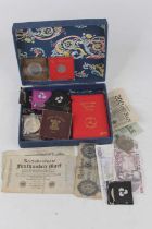 A collection of miscellaneous coins to include Isle of Man decimal coin wallet, Britains First