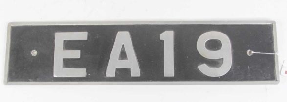 A Republic of Cyprus personalised numberplate, of aluminium construction, on a black ground with