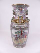 A large Chinese Canton export floor vase, having everted rim to a baluster body, with shi-shi