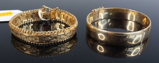 A 9ct gold and loaded hinged bangle, w.63mm; together with a bright cut gold plated sectional
