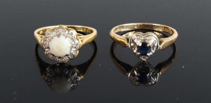 A modern 9ct gold blue & white sapphire dress ring, the stones in a heart shape setting, size L,