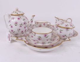 A Royal Worcester tete-a-tete tea service with painted floral decoration throughout Short hairline
