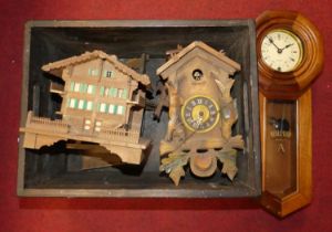 A 20th century walnut cased regulator style wall clock, the painted dial showing Roman numerals,