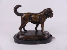 After J Chermin, a bronze figure of a boxer showing standing on an oval base, mounted to further