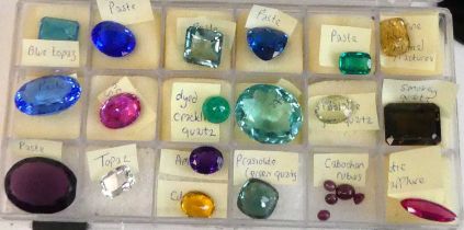 A box of mixed loose stones, to include oval ruby cabochons, amethyst, citrine, smoky quartz,