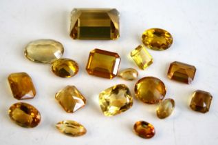 A collection of loose vari-cut citrine stones, the smallest oval cut measuring approx 9.3 x 7.3 x