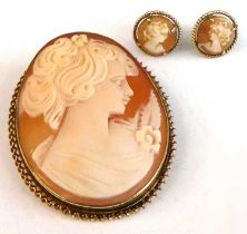 A 9ct yellow gold cameo brooch and earring set, the oval shell cameo brooch depicting a classical