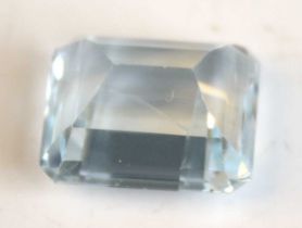 A loose octagonal cut aquamarine measuring approx 15.8 x 12.83 x 8.9mm and estimated as weighting
