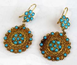 A pair of 18ct yellow gold turquoise drop earrings, each featuring a circular openwork drop set with
