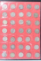 United States of America, a folder of coins to include half dollars, quarter dollars and one