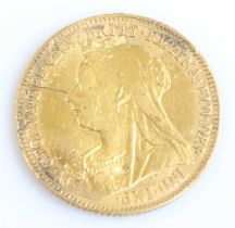 Great Britain, 1897 gold half sovereign, Victoria veiled bust, rev: St George and Dragon above date.