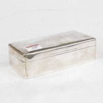 A George V silver clad table cigarette box, of hinged rectangular form, having a cedar lined