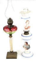 An early 20th century French opaline glass oil lamp, the shade printed with Josephine, and the