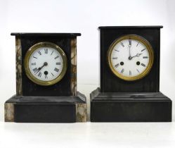 A Victorian black slate cased mantel clock, of typical form, having an enamelled dial with Roman