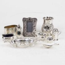 A George III silver tea caddy spoon in the Thread pattern, having an engraved bowl; together with