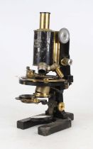 An early 20th century Karl Zeiss Jena compound microscope of lacquered brass and iron construction