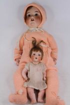 An early 20th century Armand Marseilles bisque headed doll, having rolling glass eyes and two