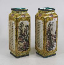 A pair of Chinese export vases of kong shape, having canted rectangular cartouche printed with a