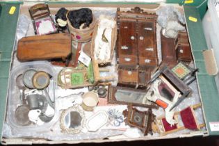 A box of assorted dolls house furniture, to include armoire, longcase clock, highback chair,