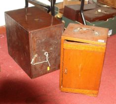 An early 20th century mahogany microscope case lacking contents, height 36cm, together with one