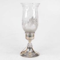 A late 20th century candle lantern, having a bell shaped glass bowl etched with flowers, on a