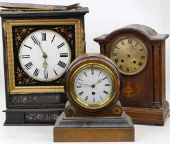 A Victorian walnut and ebonised cased drum head mantel clock, having an enamelled dial with Roman