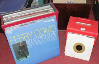 A collection of vintage 12" vinyl records to include Nat King Cole - Come Closer to Me, and Roger