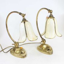 A pair of Arts & Crafts style adjustable brass table lamps, each having marbled glass tulip shaped