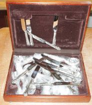 A 20th century stained beech cased six-place setting canteen of silver plated cutlery