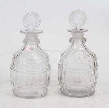 A pair of 19th century cut glass spirit barrels and stoppers, height 21cm