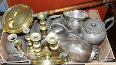 A box of miscellaneous metalware, to include two pairs of turned brass candlesticks, brass warming