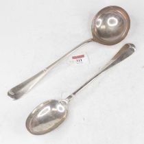 A large George V silver ladle, together with a matching silver serving spoon, each in the Hanoverian