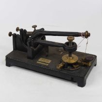 A Scientific Instrument Company of Cambridge rocking microtome, of cast iron and brass construction,