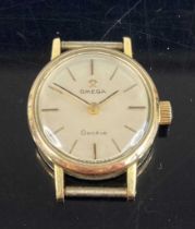 A lady's Omega Geneve gold plated and steel manual wind wristwatch (lacking bracelet), dia. 20mm