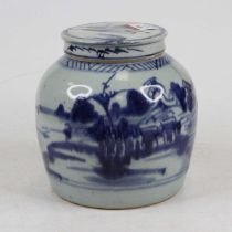 A Chinese blue & white stoneware ginger jar and cover, underglaze decorated with a landscape, height