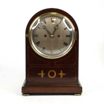 An Edwardian mahogany and satin wood inlaid dome top mantel clock, the silvered dial with Roman