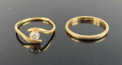 An 18ct gold diamond solitaire ring, the bezel set round cut weighing approx 0.1ct, size I, together