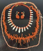 A natural coral strand necklace together with a beaded coral and mother of pearl necklace, one other