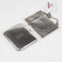 An early 20th century silver visiting card case, of shaped rectangular form, engraved with butterfly